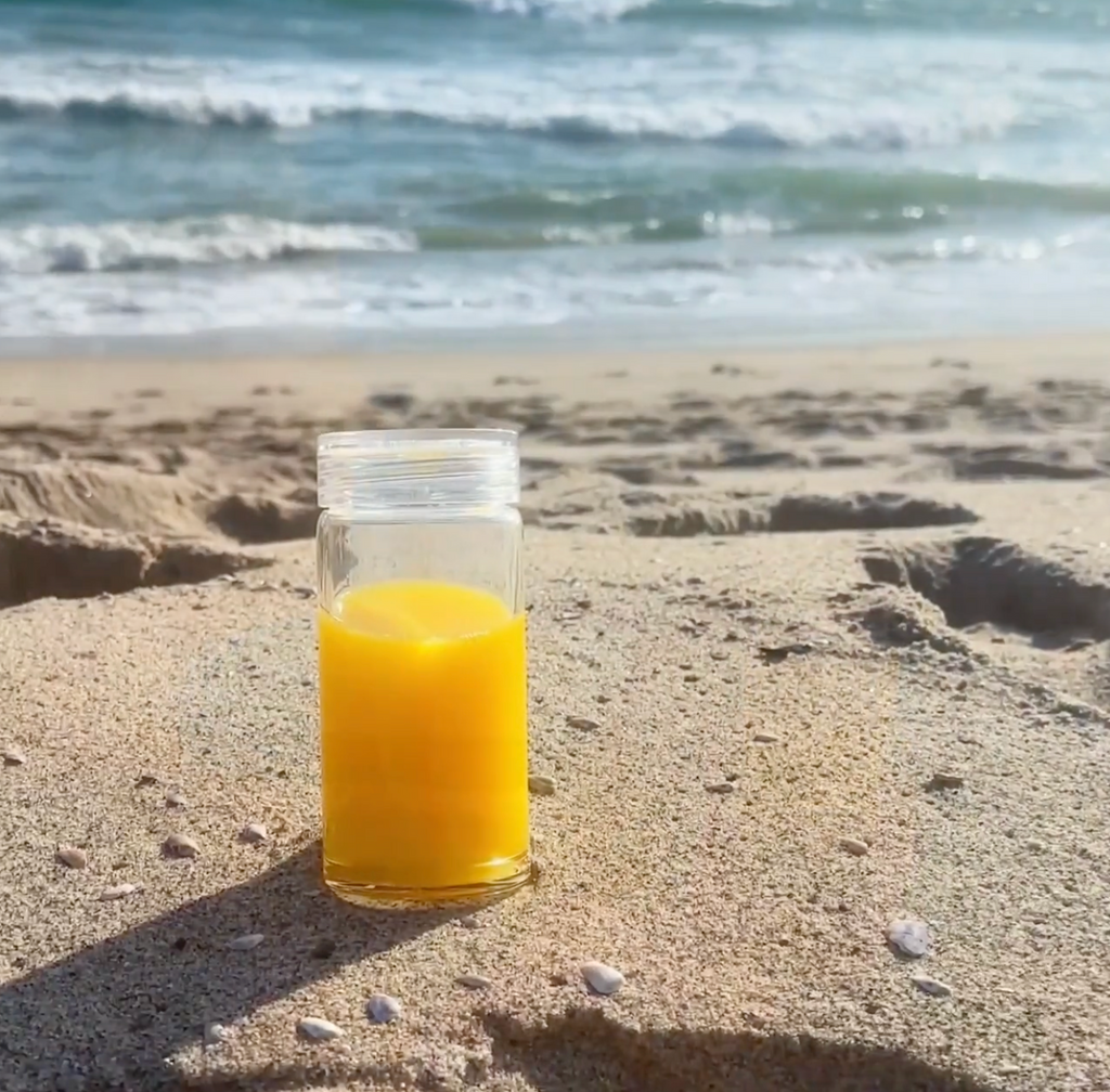 Glass bottle on beach
